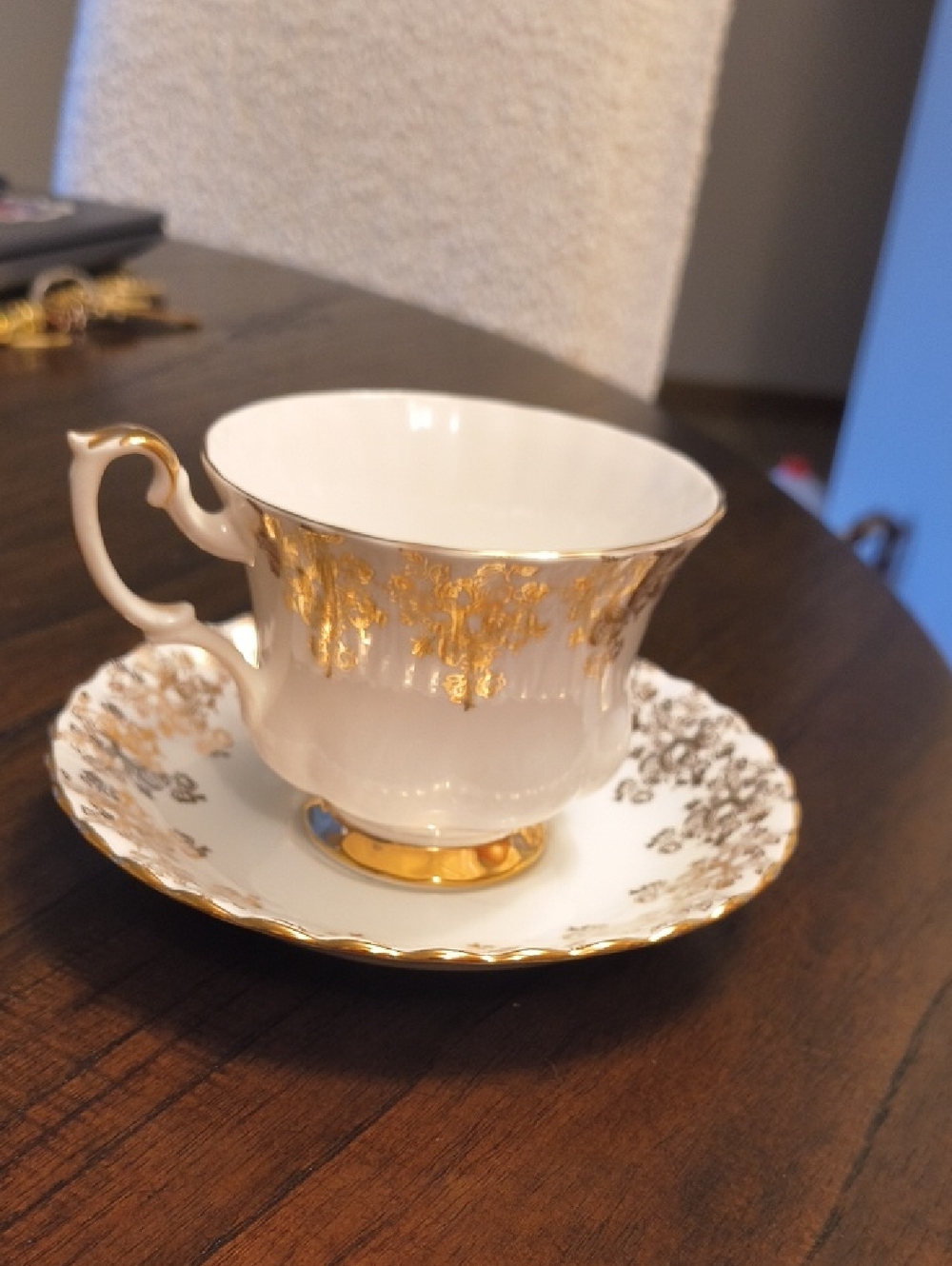 Royal Albert White and Gold Porcelain Teacup and Saucer